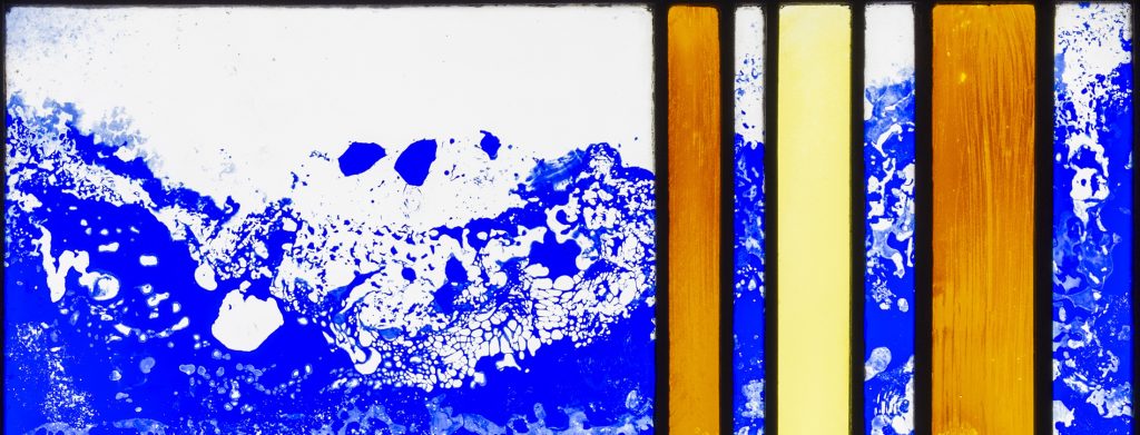 Detail of an abstract stained glass panel.